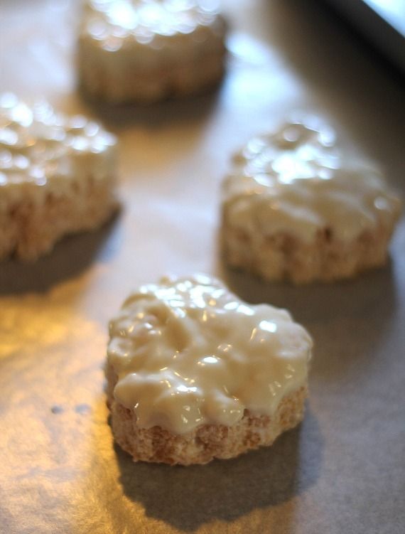 Heart-shaped rice krispie treats dipped in white chocolate