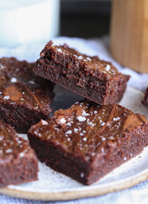 Sweet and Salty Brownies Stacked on a Plate