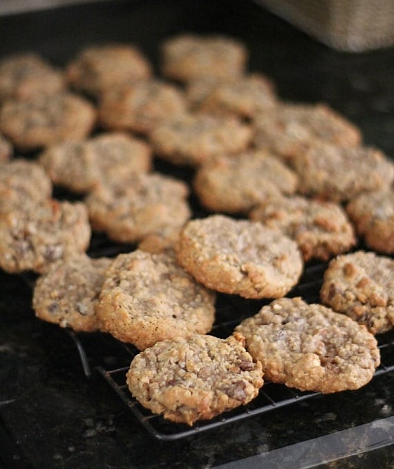 A batch of beer and pretzel cookies on a cooling rack