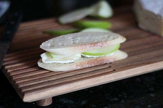 Sliced Brie and Granny Smith apple between two pieces of bread