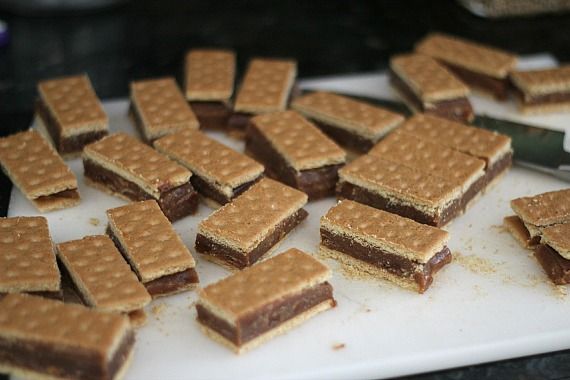 Chocolate filled Graham Cracker Bars on a cutting board
