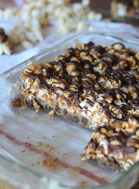 A partial pan of chocolate chip and peanut butter popcorn bars