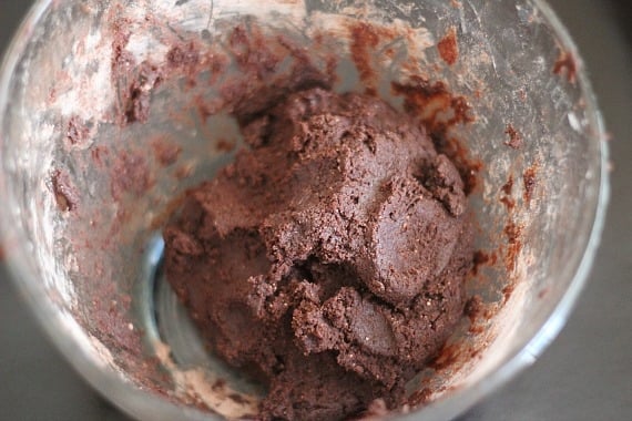 Top view of thick brownie batter in a mixing bowl