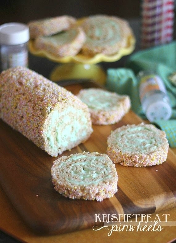 A log of Krispie Treat Pinwheels with a couple slices cut