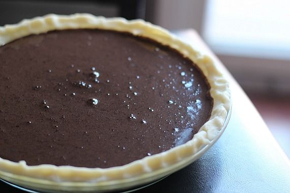 An unbaked pie with chocolate filling