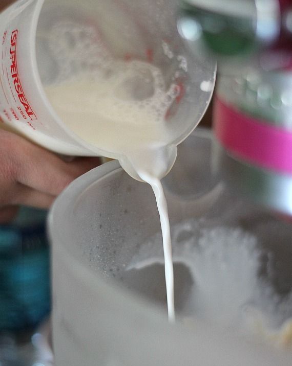 Wet ingredients being added to dry ingredients for vanilla muffins