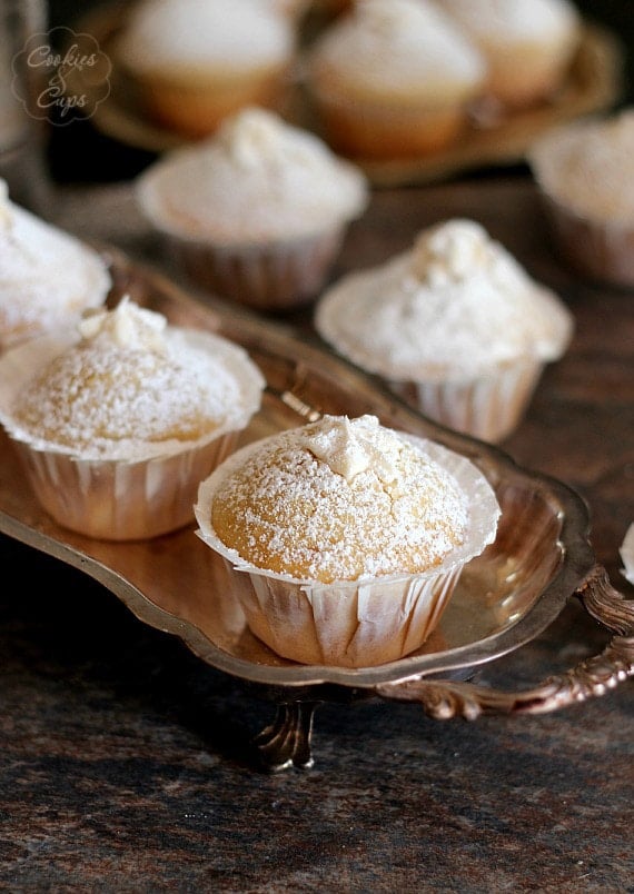 Vanilla Cream Filled Powdered Sugar Muffins | Cookies and Cups