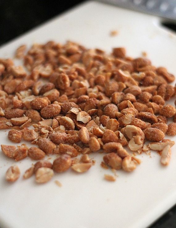 Chopped peanuts on a cutting board