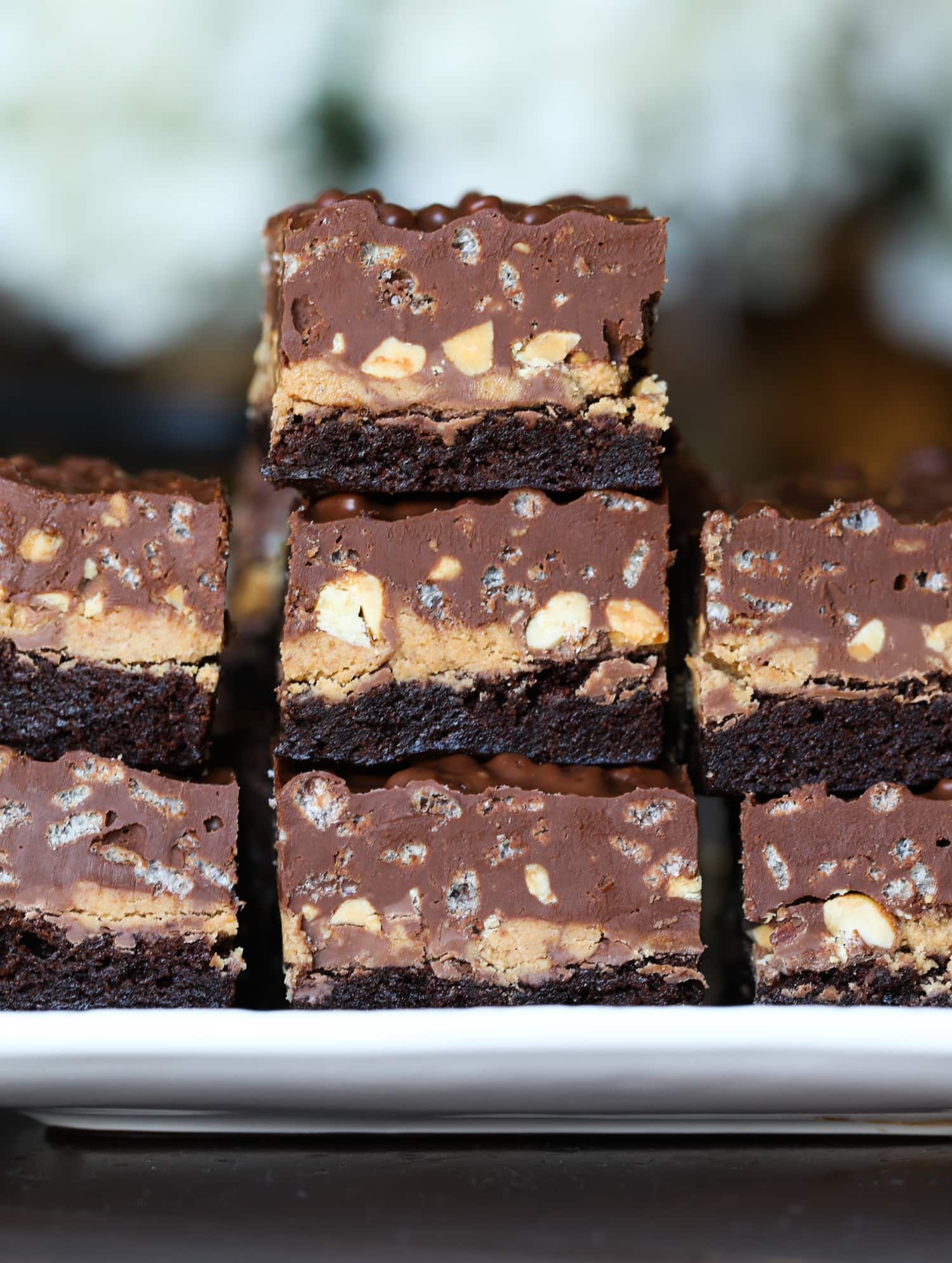 Peanut Butter Cup brownies topped with a crispy chocolate fudge layer