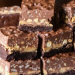 Peanut Butter Cup Crack Brownies stacked on a plate