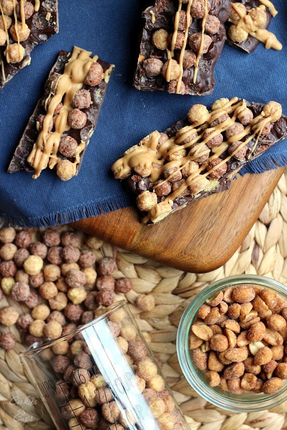 Peanut Butter Cup Candy Bars ~ A cross between a candy bar and bark, loaded with peanut butter cups, peanuts and Reese's Puffs Cereal!