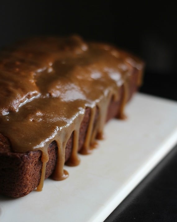 A loaf of banana bread with brown butter glaze