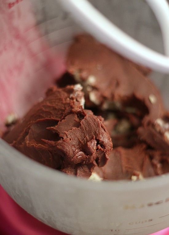 Thick chocolate buttercream in a stand mixer bowl