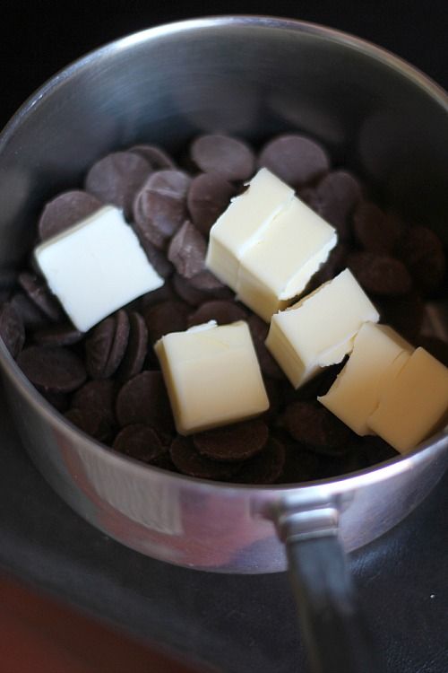 Chocolate and chunks of butter in a saucepan