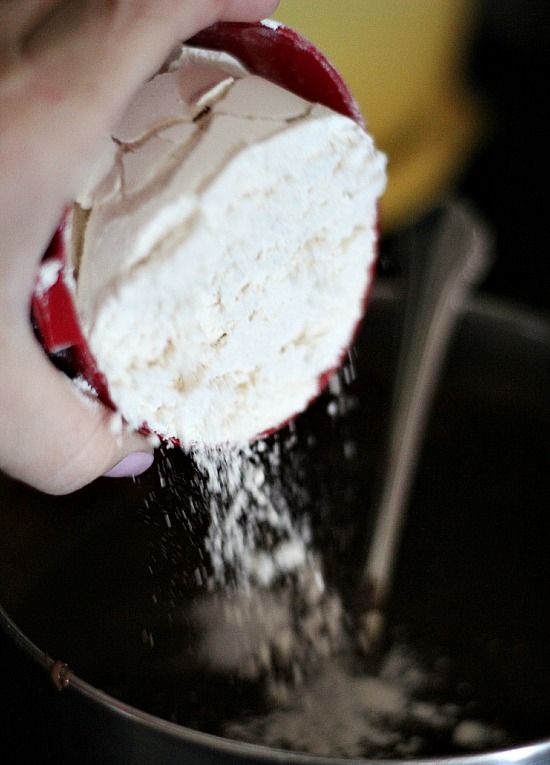 Dry ingredients being added to brownie batter