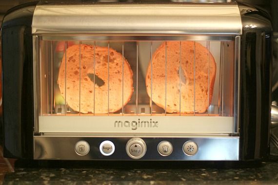 Two bagel halves in a Magimix View toaster