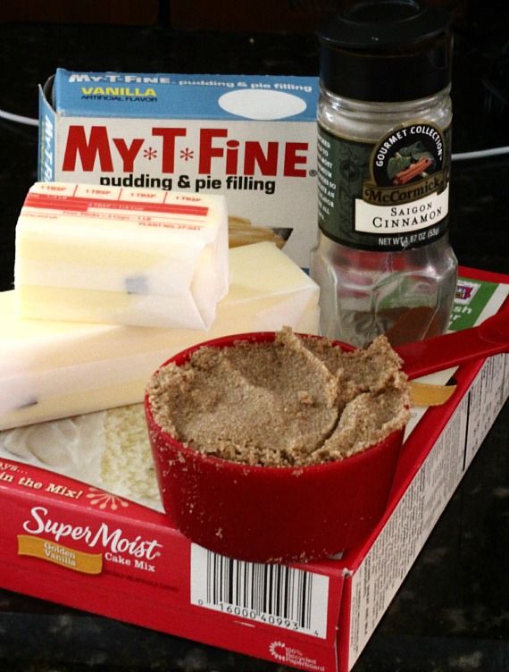 Ingredients for Cinnamon Roll Cookie Bars, including butter cinnamon, brown sugar, cake mix and pudding mix