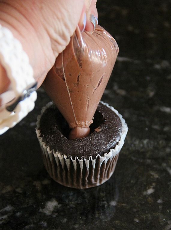 Image of Piping Brownie Batter into Cupcake
