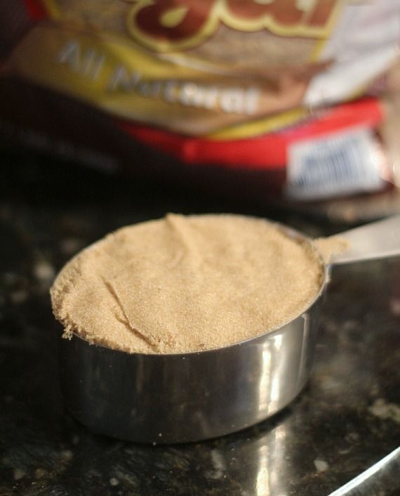 Packed brown sugar in a measuring cup