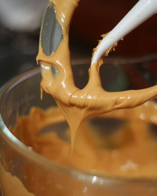 Smooth peanut butter and butter mixture in a stand mixer bowl