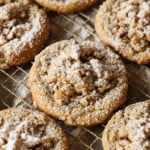 Coffee Cake Cookies on a cooling rack sprinkled with powdered sugar