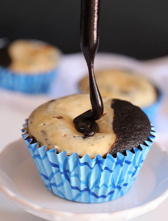 Devils Food Cheesecake Stuffed Snickers Cupcakes