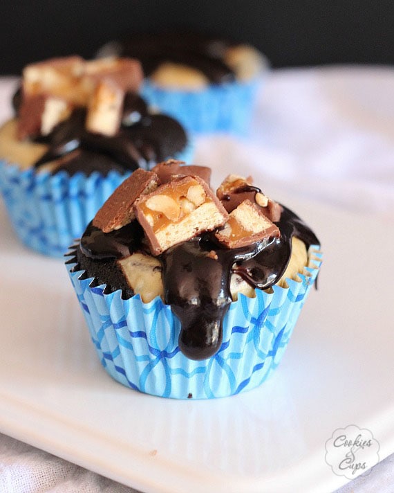 Devil's Food Snickers Cheesecake Cupcakes | www.cookiesandcups.com | #cupcakes #recipes #snickers #cheesecake #devilsfood