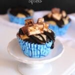 Devil's Food Snickers Cheesecake Cupcakes | www.cookiesandcups.com | #cupcakes #recipes #snickers #cheesecake #devilsfood
