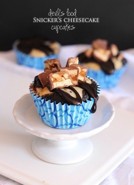 Devil's Food Snickers Cheesecake Cupcakes | www.cookiesandcups.com | #cupcakes #recipes #snickers #cheesecake #devilsfood