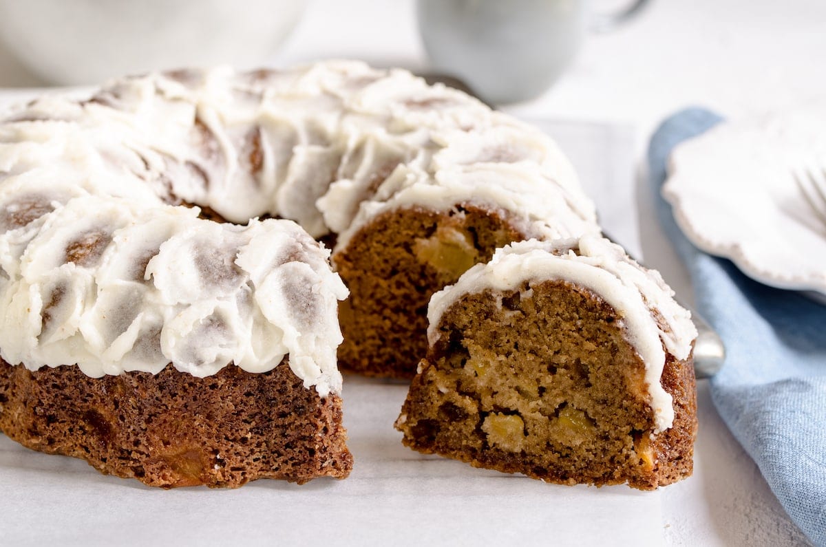 Brown butter apple bundt cake with a slice taken out