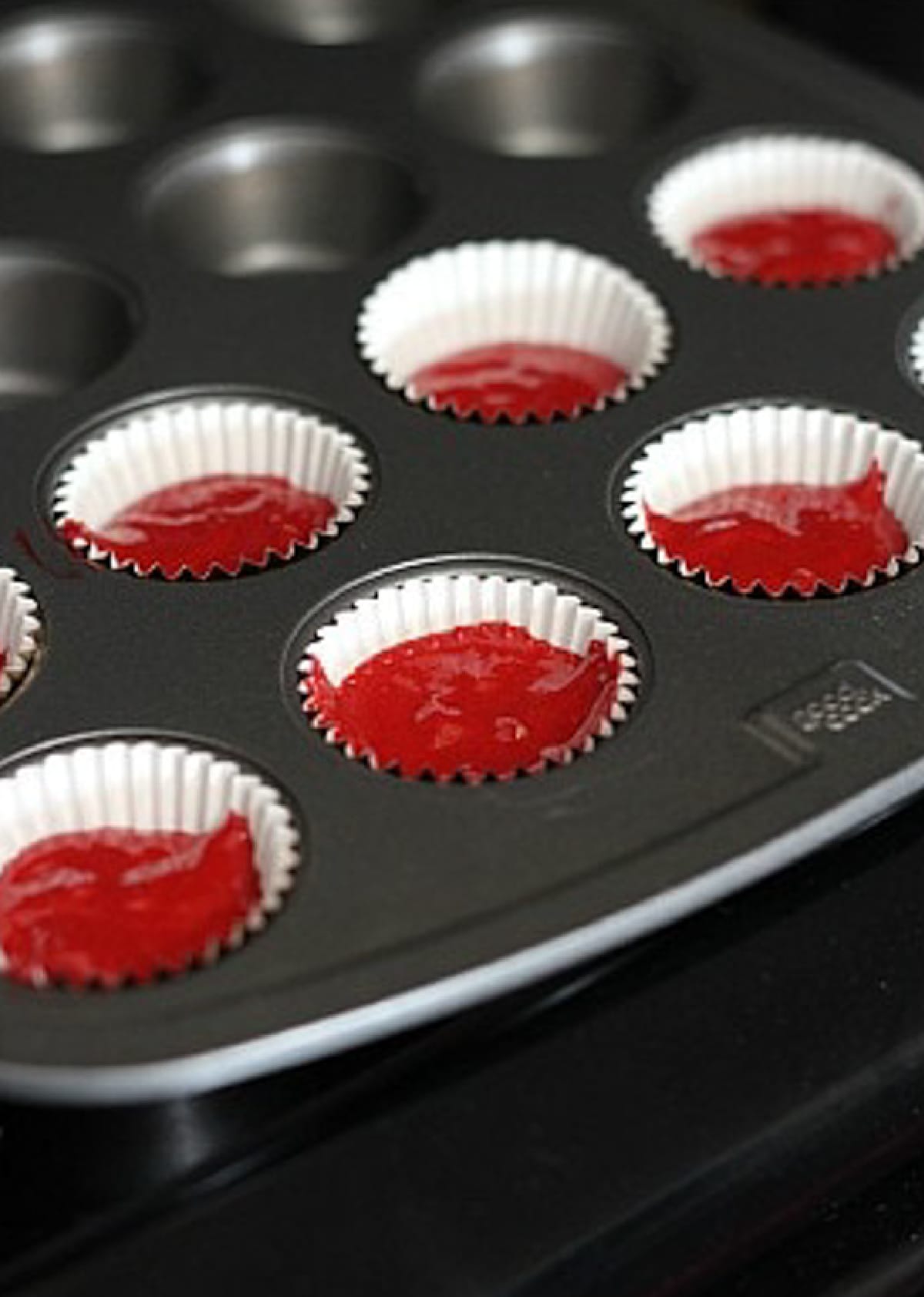 Red Velvet vake batter in a mini cupcake pan