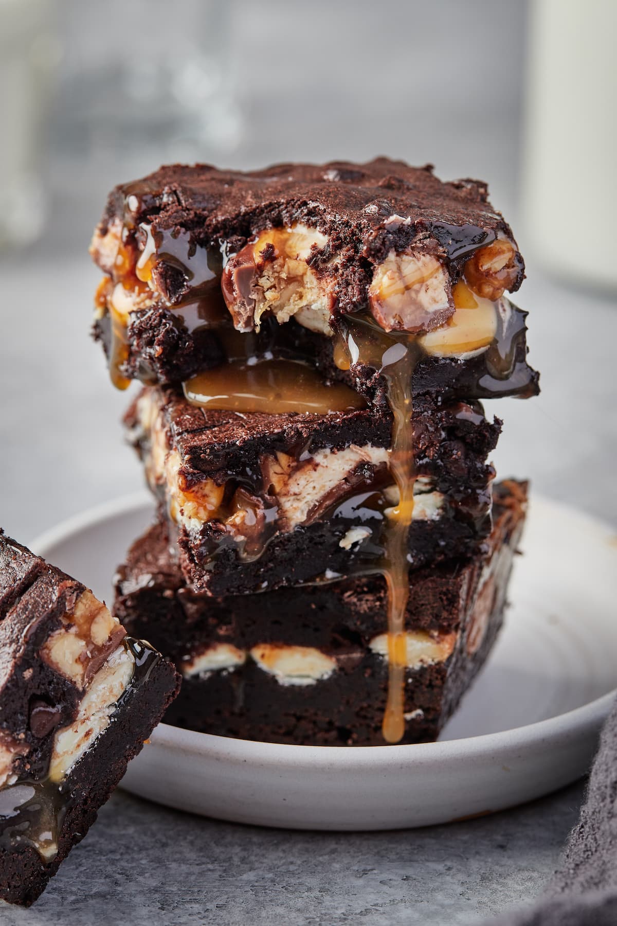 A stack of gooey chocolate brownie bars.