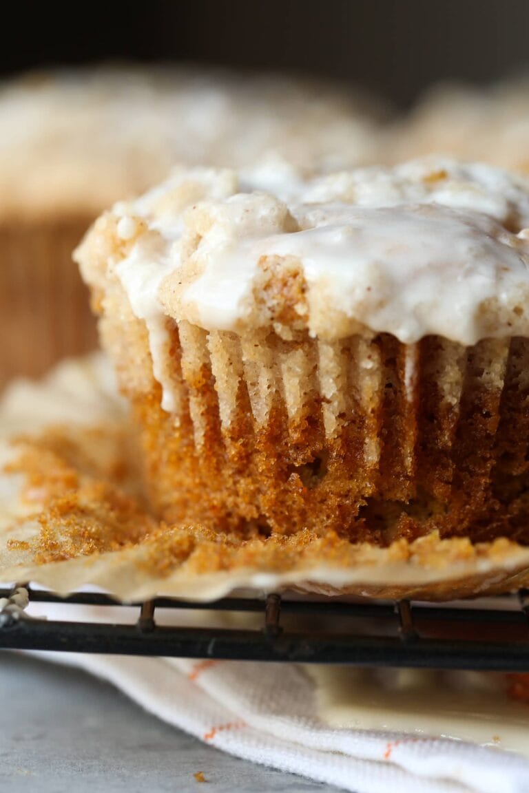 Close-up of pumpkin apple muffin with glaze.