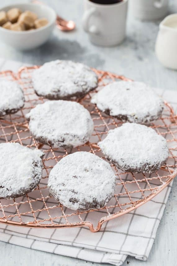 Puppy Chow Cookies! These are a delicious peanut butter cookie coated in chocolate and powdered sugar! The cookie version of the popular snack mix!