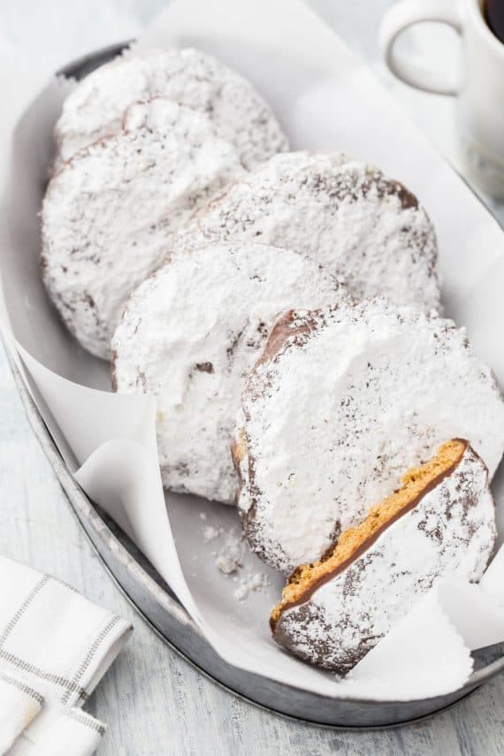 Puppy Chow Cookies! These are a delicious peanut butter cookie coated in chocolate and powdered sugar! The cookie version of the popular snack mix!