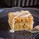 A slice of banana crumb cake with icing