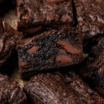 Close up of assorted fudgy cake mix brownies filled with chocolate chunks.