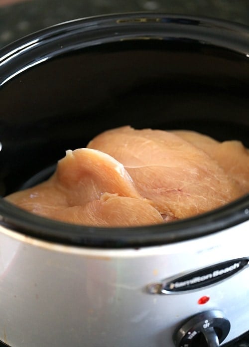 Slow Cooker Fiesta Chicken. Easy, low fat and can be used for so many dinners! | www.cookiesandcups.com