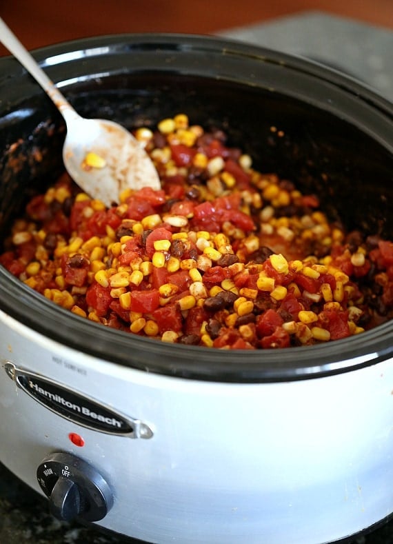 Slow Cooker Fiesta Chicken. Easy, low fat and can be used for so many dinners! | www.cookiesandcups.com