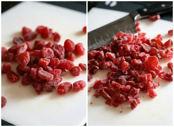 Side by side images of dried strawberries being chopped on a cutting board.