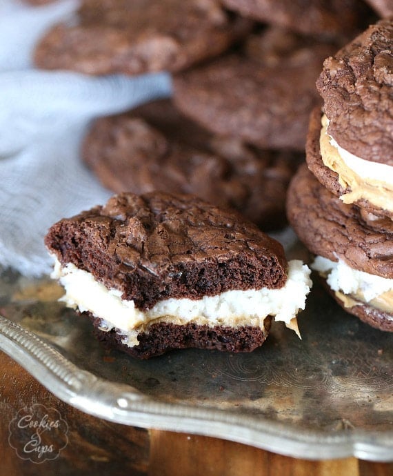 Brownie Cookie Sandwiches ~ The perfect chewy brownie cookie that I filled with frosting and peanut butter!