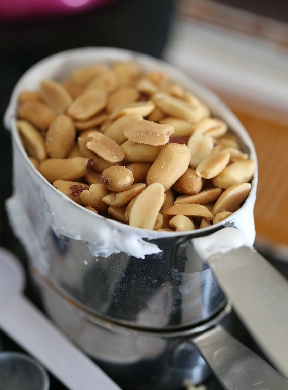 Salty Caramel Peanut Bars ~ These easy bars have a brown sugar pretzel crust layered with peanut butter nougat and topped with salty peanuts and caramel!