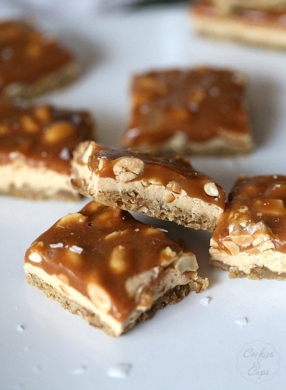 Salty Caramel Peanut Bars ~ These easy bars have a brown sugar pretzel crust layered with peanut butter nougat and topped with salty peanuts and caramel!