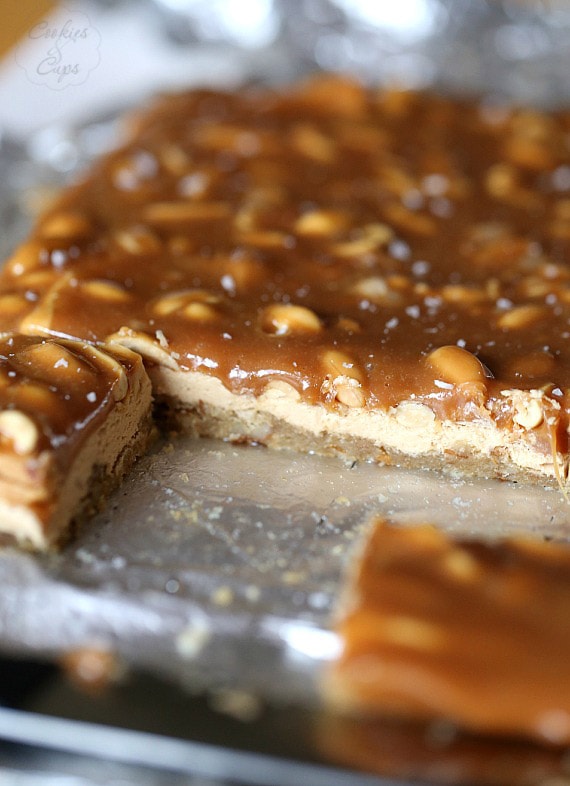 Salty Caramel Peanut Bars ~ These easy bars have a brown sugar pretzel crust layered with peanut butter nougat and topped with salty peanuts and caramel!