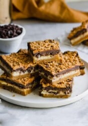 Plate of stacked chocolate cookie bars.