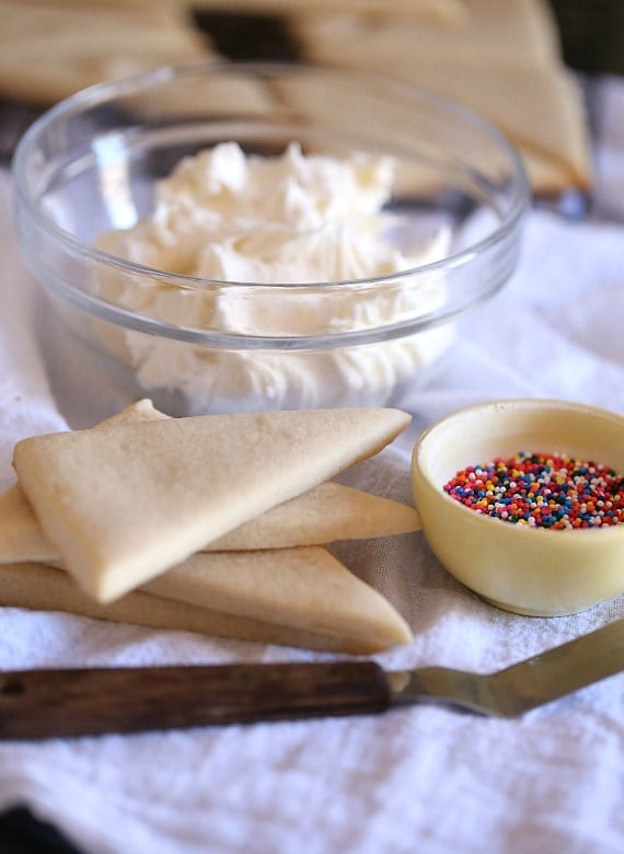 Fairy Toast Cookies ~ A Simple Spin on classic Fairy Toast. It's a buttery cookie topped with a butter frosting and loads of sprinkles!