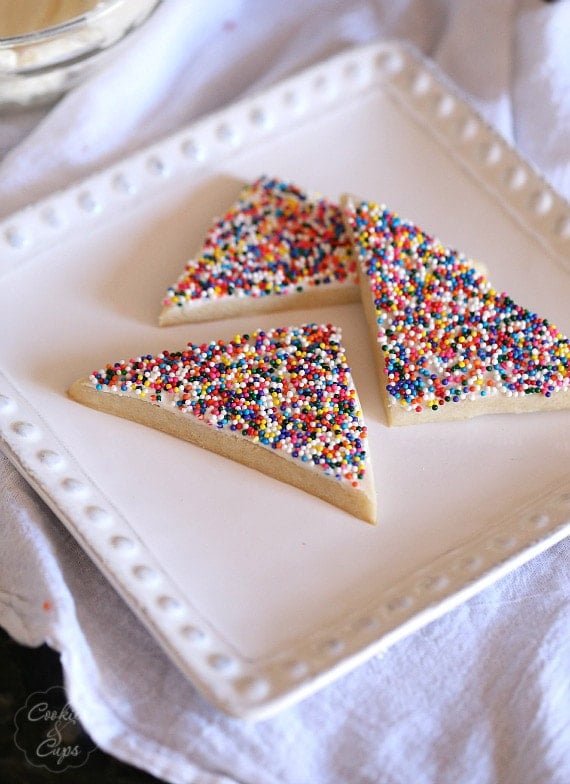 Fairy Toast Cookies ~ A Simple Spin on classic Fairy Toast. It's a buttery cookie topped with a butter frosting and loads of sprinkles!