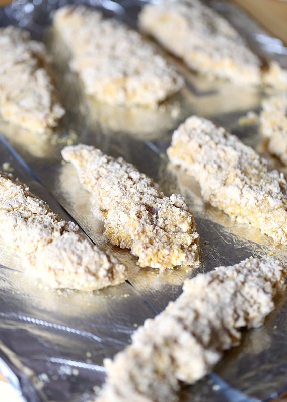 Cool Ranch Doritos Chicken Fingers ~ An easy weeknight meal. Chicken tenders coated in Cool Ranch Dorito chips and baked! Crispy on the outside!