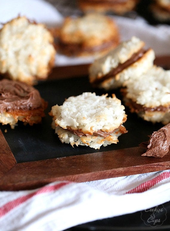 Coconut Macaroon Cookie Sandwiches ~ Two coconut macaroons sandwiched together with a creamy chocolate filling!