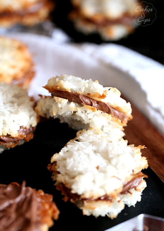 Coconut Macaroon Cookie Sandwiches ~ Two coconut macaroons sandwiched together with a creamy chocolate filling!